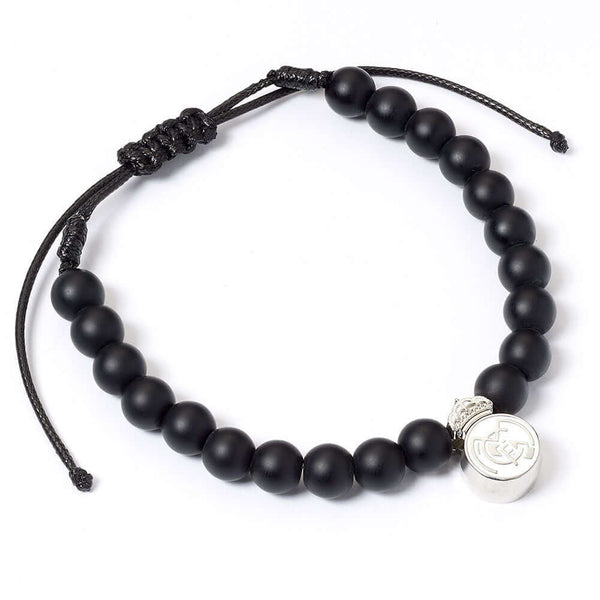 Real Madrid FC Black Bead Bracelet LKT Sport Matte black ball bead braceletFeaturing a Madrid charmOfficial licensed productSuitable for ages 14+Charm approx 12mm x 12mm Bracelets