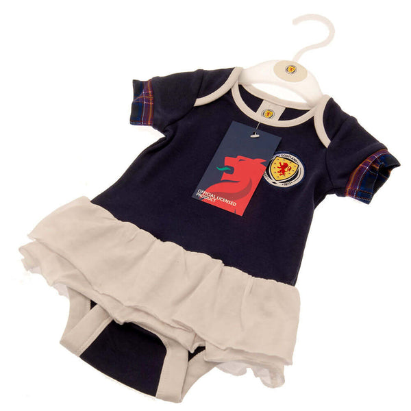 Scottish FA Tutu 9-12 Mths TN LKT Sport This short sleeved tutu bodysuit features a double frill skirt designDesign inspired by the 2022-23 season kit with a full colour woven crestSoft comfortable fit with press stud fasteningMade from 100% CottonOfficia