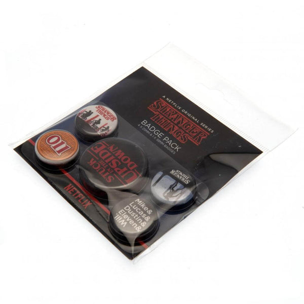 Stranger Things Button Badge Set LKT Sport Eye-catching designs and slogan badgesIdeal addition to school bags or clothingFasten with a safety pin fixingOfficial licensed product5 assorted size badges Pinback Buttons