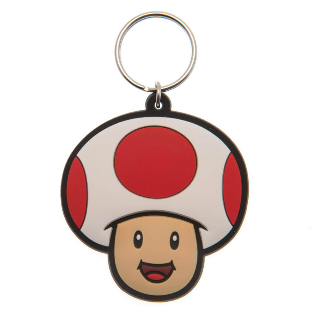 Super Mario Toad PVC Keyring LKT Sport Soft, durable 5mm thick PVC Keyring with chain and split ringBright, colourful and highly detailedIdeal for attaching to keys, bags, belts and other itemsWipe cleanOfficial licensed productApprox 55mm x 50mm Keychain