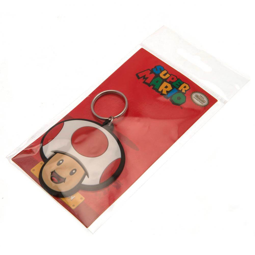 Super Mario Toad PVC Keyring LKT Sport Soft, durable 5mm thick PVC Keyring with chain and split ringBright, colourful and highly detailedIdeal for attaching to keys, bags, belts and other itemsWipe cleanOfficial licensed productApprox 55mm x 50mm Keychain