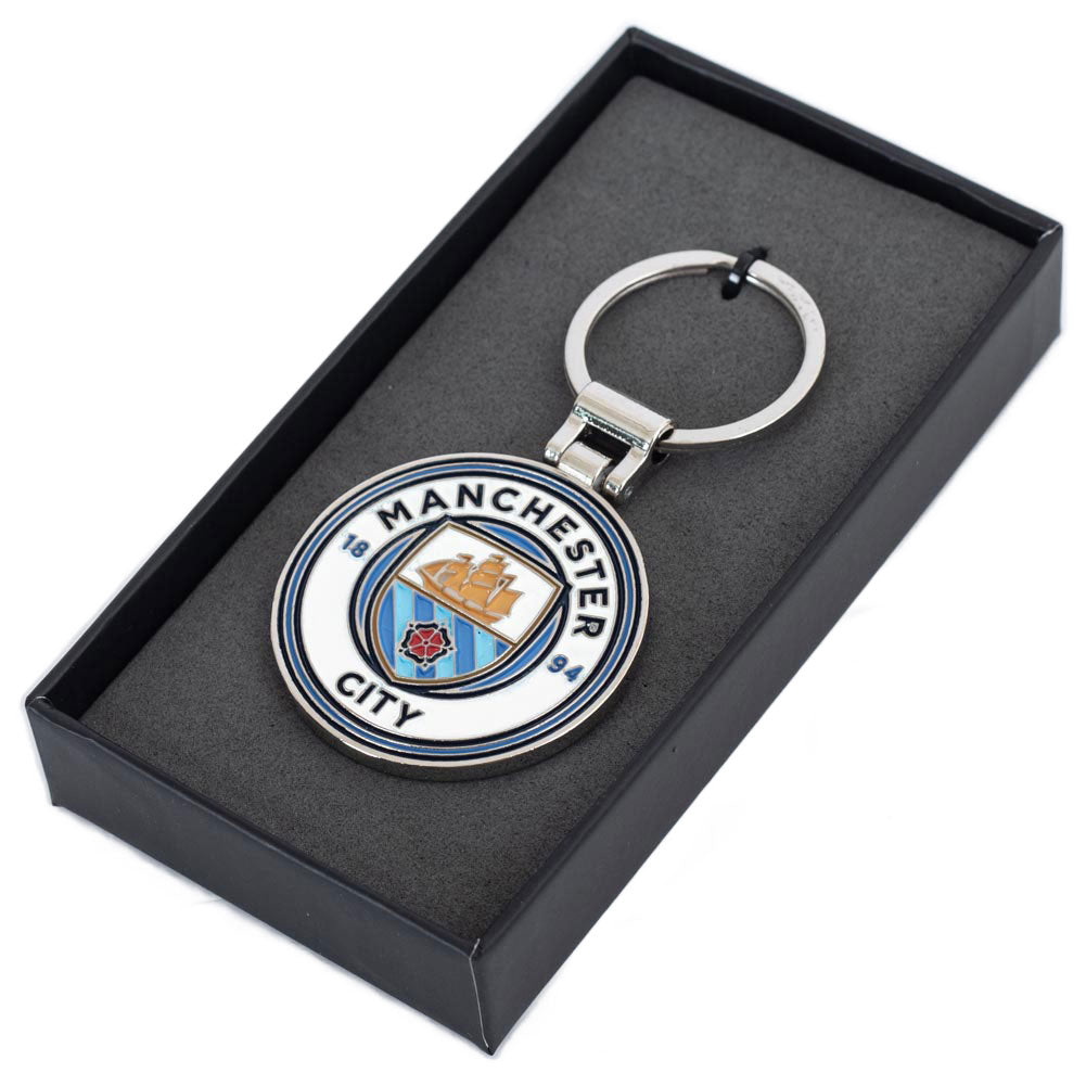  https://imageoffloads.taylorsmerchandise.com/wp-content/uploads/TM-06053-Manchester-City-FC-Executive-Crest-Keyring-2.jpg