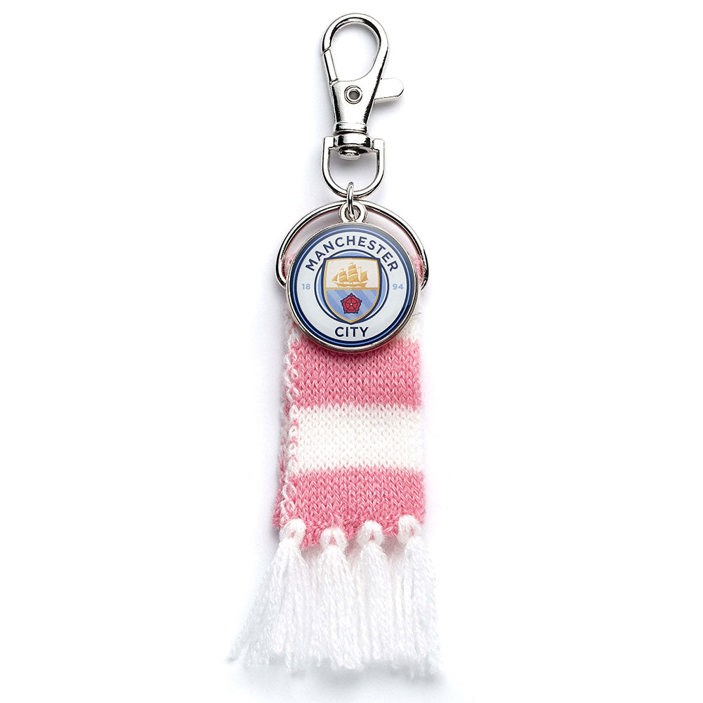  https://imageoffloads.taylorsmerchandise.com/wp-content/uploads/TM-06373-Manchester-City-FC-Pink-Bar-Scarf-Bag-Charm-1.jpg