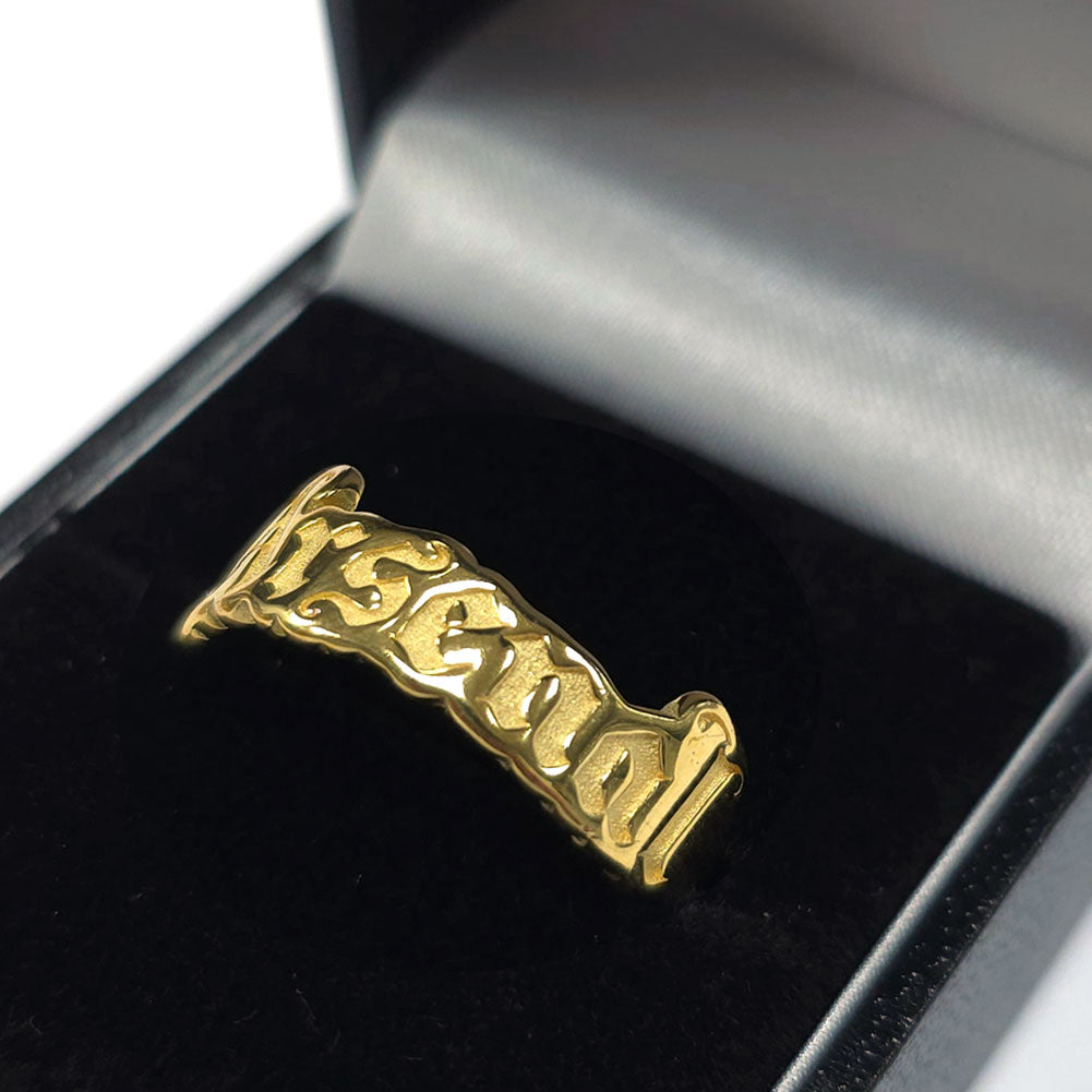 https://imageoffloads.taylorsmerchandise.com/wp-content/uploads/TM-06436-Arsenal-FC-18ct-Gold-Plated-on-Silver-Text-Ring.jpg