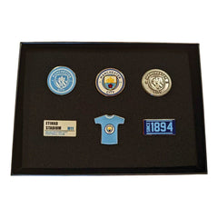 https://imageoffloads.taylorsmerchandise.com/wp-content/uploads/TM-06449-Manchester-City-FC-6pc-Badge-Set.jpg