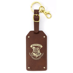 https://imageoffloads.taylorsmerchandise.com/wp-content/uploads/TM-07808-Harry-Potter-Hogwarts-Luggage-Tag.jpg