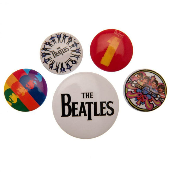 The Beatles 1 Album Button Badge Set LKT Sport Eye-catching designs and slogan badgesIdeal addition to school bags or clothingFasten with a safety pin fixingOfficial licensed product5 assorted size badges Pinback Buttons