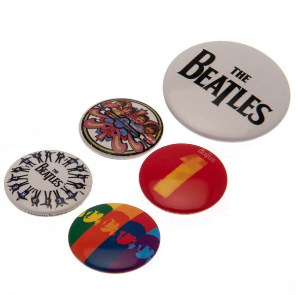 The Beatles 1 Album Button Badge Set LKT Sport Eye-catching designs and slogan badgesIdeal addition to school bags or clothingFasten with a safety pin fixingOfficial licensed product5 assorted size badges Pinback Buttons