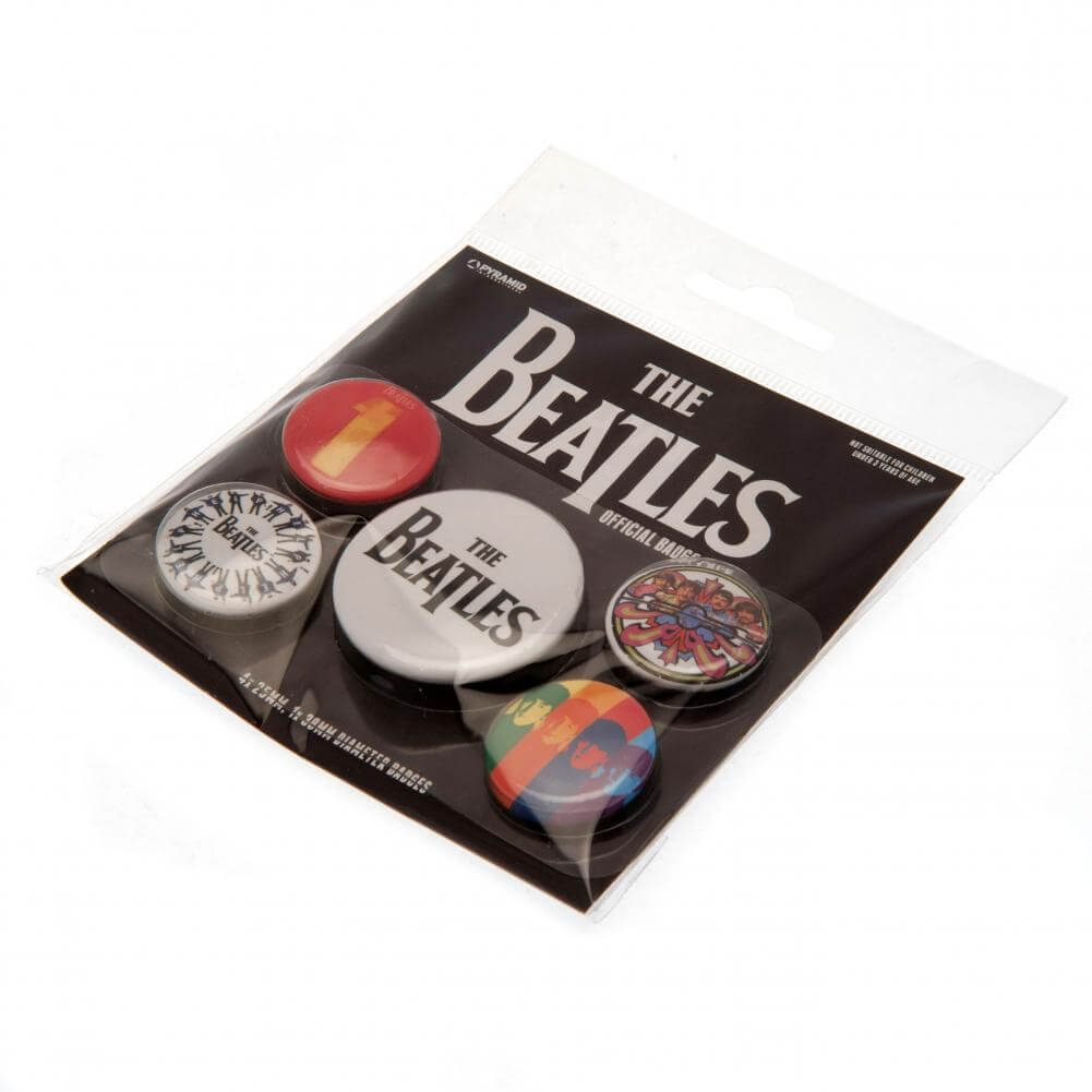 The Beatles 1 Album Button Badge Set LKT Sport Eye-catching designs and slogan badgesIdeal addition to school bags or clothingFasten with a safety pin fixingOfficial licensed product5 assorted size badges Pinback Buttons