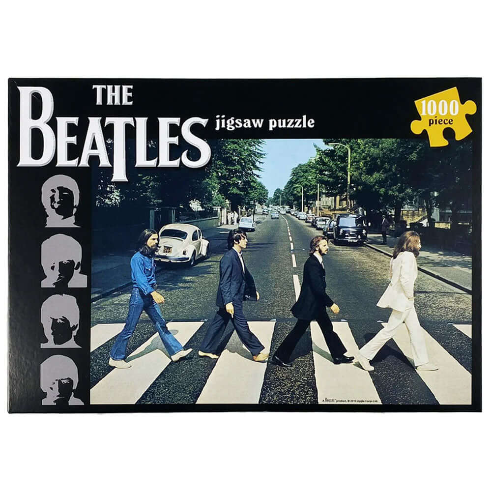 The Beatles Abbey Road 1000pc Puzzle LKT Sport Classic 1000pc jigsaw puzzleMakes up a picture of the Beatles crossing the famous Abbey RoadSuitable for ages 12+Official licensed productApprox 69cm x 49cm Jigsaw Puzzles Main image