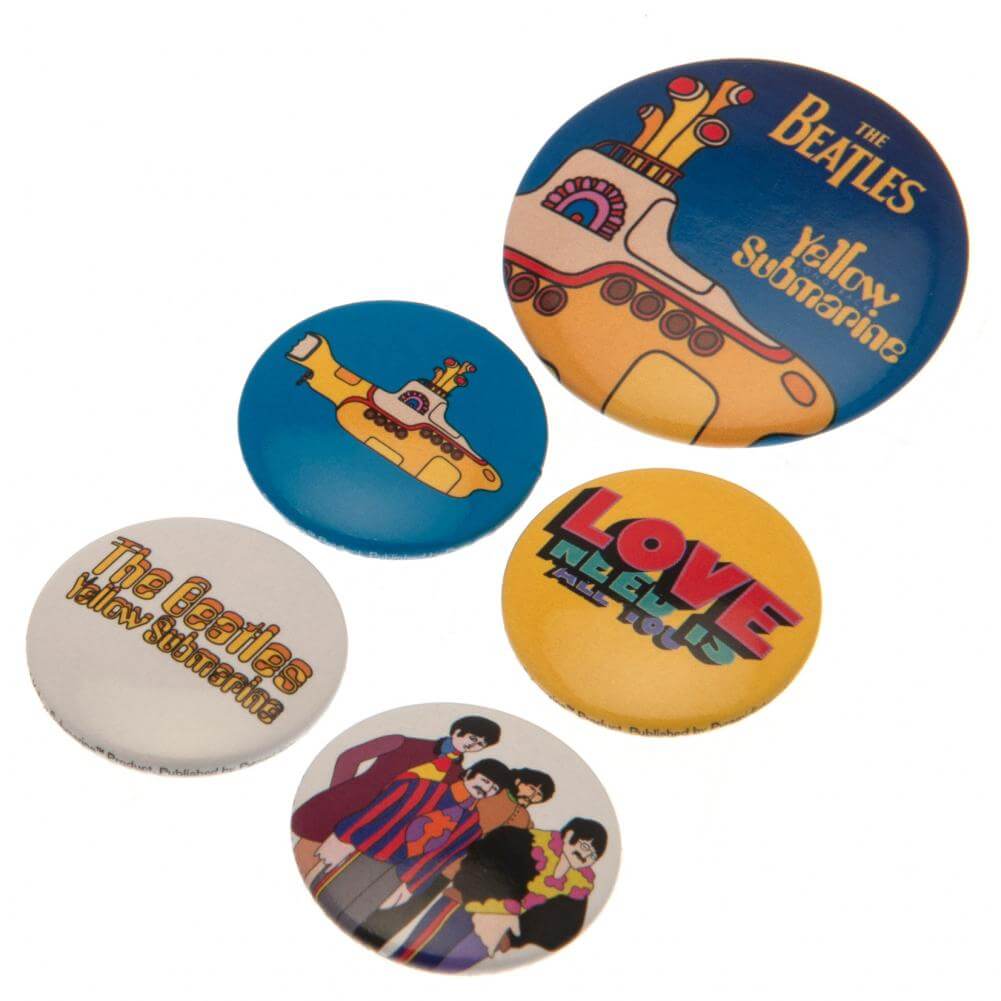 The Beatles Yellow Submarine Button Badge Set LKT Sport Eye-catching designs and slogan badgesIdeal addition to school bags or clothingFasten with a safety pin fixingOfficial licensed product5 assorted size badges Pinback Buttons