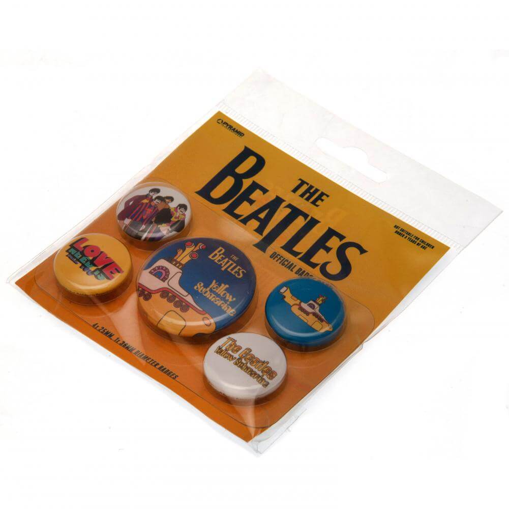 The Beatles Yellow Submarine Button Badge Set LKT Sport Eye-catching designs and slogan badgesIdeal addition to school bags or clothingFasten with a safety pin fixingOfficial licensed product5 assorted size badges Pinback Buttons
