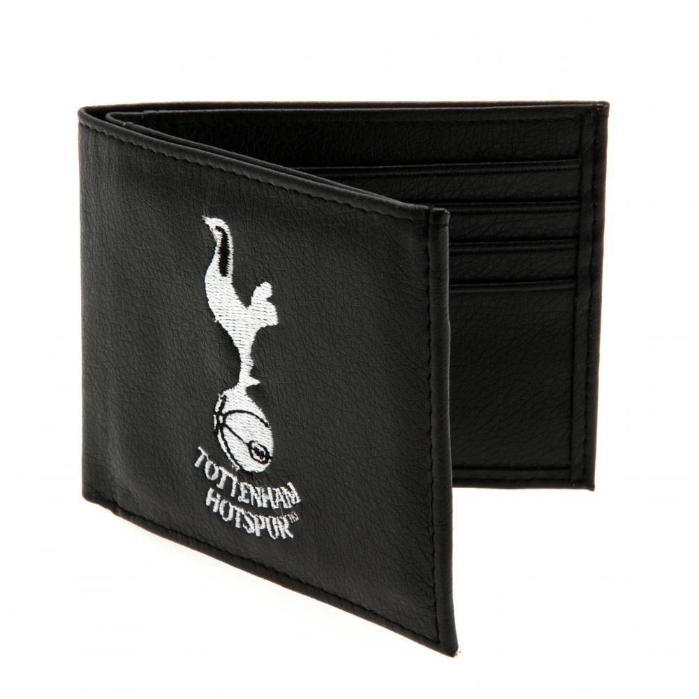 Tottenham Hotspur FC Embroidered Wallet LKT Sport Black PU wallet featuring a large embroidered club crest 3 card slots, a window slot and 2 note pockets Change pocket with secure stud fastener 2 additional compartments Official licensed product Approx 11