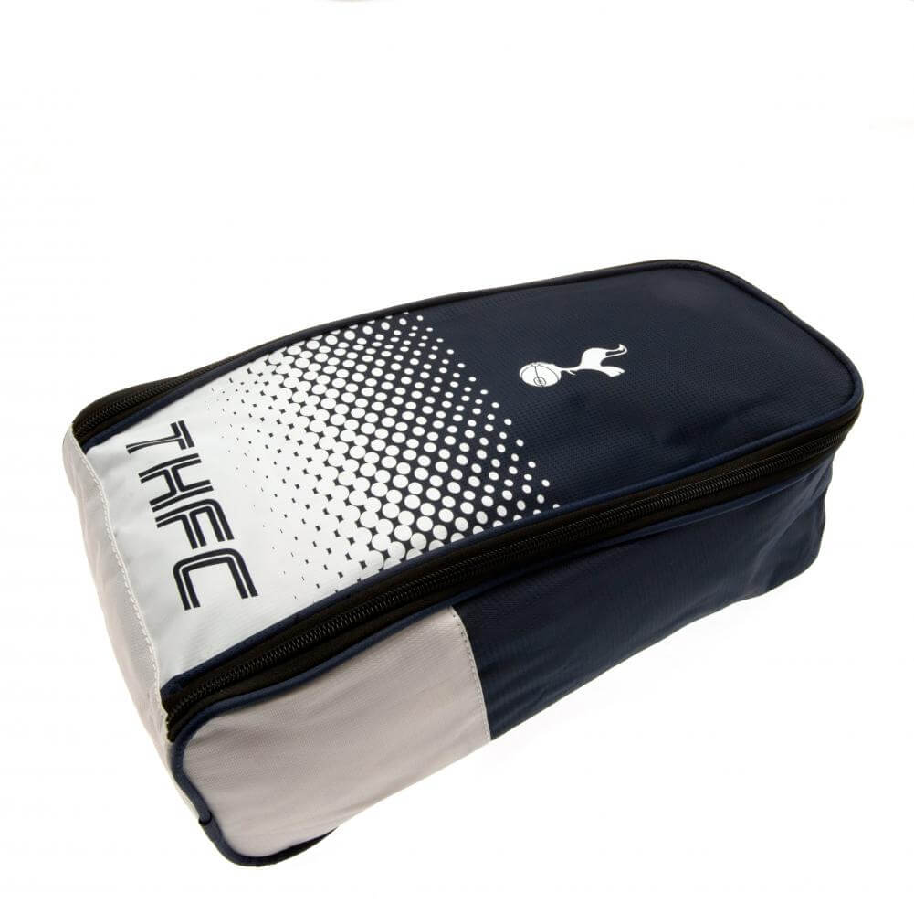 Tottenham Hotspur FC Fade Boot Bag LKT Sport Fade design boot bag featuring THFC text and club crestLarge double zipped opening for easy accessWipe clean polyesterOfficial licensed productApprox 35cm x 18cm x 12cm Soccer Bags & Carriers