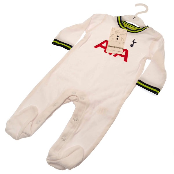 Tottenham Hotspur FC Sleepsuit 3-6 Mths LG LKT Sport This long sleeved baby sleepsuit features the famous navy and white colours of SpursDesign inspired by the 2022-23 season kit with a printed club crest and sponsorSoft comfortable fit with press stud fa