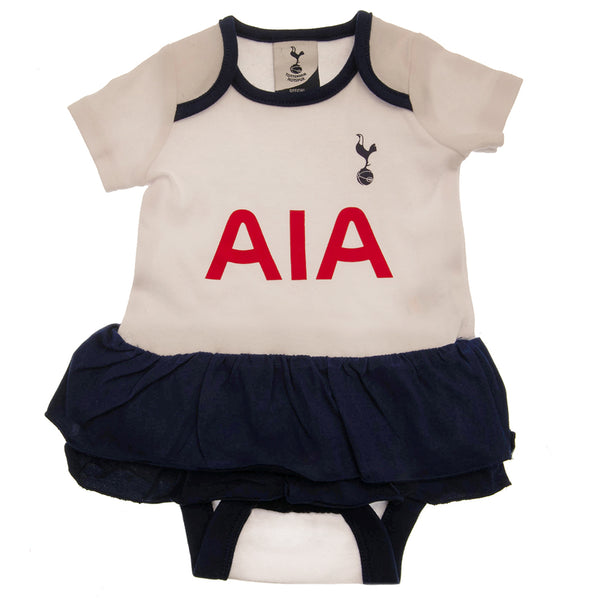 Tottenham Hotspur FC Tutu 0/3 mths LKT Sport This short sleeved tutu bodysuit features a double frill skirt designInspired by the classic Spurs white and navy colours with a club crest and printed sponsorSoft comfortable fit with press stud fasteningMade
