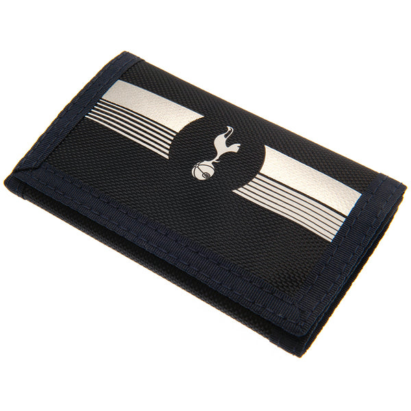 Tottenham Hotspur FC Ultra Wallet LKT Sport Ultra design wallet featuring a full colour club crest5 separate internal compartmentsExternal zipped pocketWipe clean polyesterOfficial licensed productApprox 12cm x 8cm closed Wallets