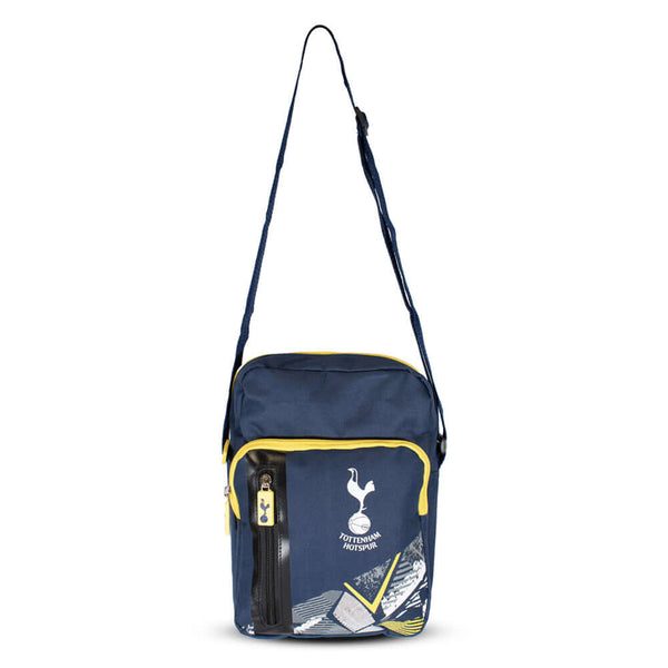 Tottenham Hotspur FC Vector Shoulder Bag LKT Sport Vector design shoulder bag featuring a Spurs club crestMain compartment has a large double zipped opening for easy access2 front zip pockets and interior open pocketAdjustable shoulder strapRubber zip pul