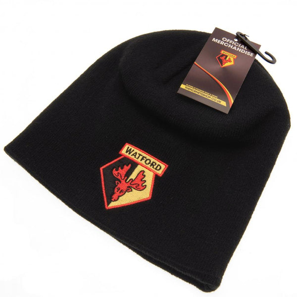 Watford FC Black Beanie LKT Sport Black dome style knitted hat Features a full colour Watford FC embroidered crest Official licensed product One size fits all With a swing tag Beanies