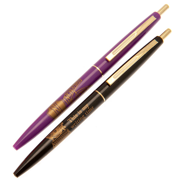 Wednesday 2pk Pen Set LKT Sport Satin finish colourful ballpoint click pensOne purple pen with the text 'Nevermore Academy' in goldOne black pen with the text 'This is my writing time' in goldWrites in black inkOfficial licensed productBoth approx 14cm Ba