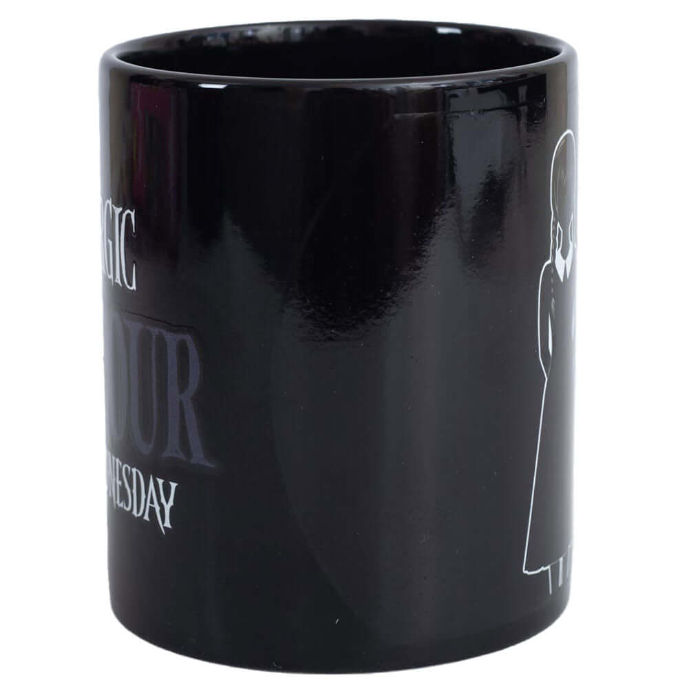 Wednesday Heat Changing Mug LKT Sport Ceramic everyday coffee mug with a heat sensitive designDesign changes as the contents heat and coolFeatures a silhouette of Wednesday in front of Ophelia windowHand wash onlyOfficial licensed productApprox 315ml (11o