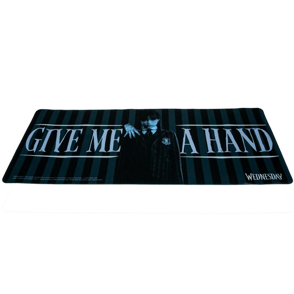 Wednesday Jumbo Desk Mat LKT Sport Large Neoprene black and white printed desk matFeaturing Wednesday, the Thing and the text 'Give me a Hand'With an anti-slip rubber baseBrighten up your desk space with this versatile and vibrant additionOfficial License