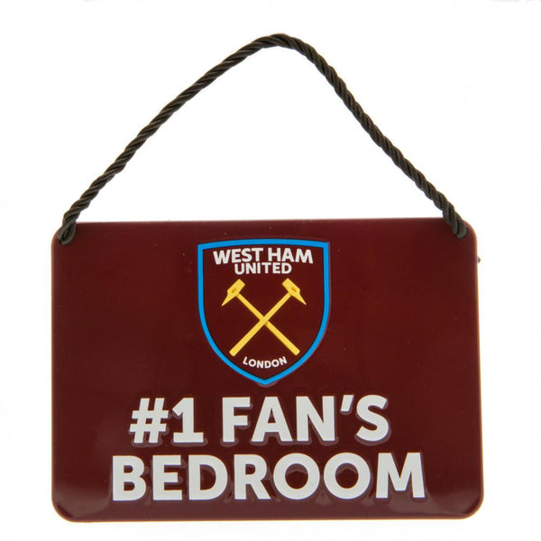 West Ham United FC Bedroom Sign No1 Fan LKT Sport Vibrant metal hanging bedroom sign With a large club crest and #1 Fan's Bedroom text Complete with a nylon rope for hanging Official licensed product Approx 16cm x 11cm On a backing card Novelty Signs
