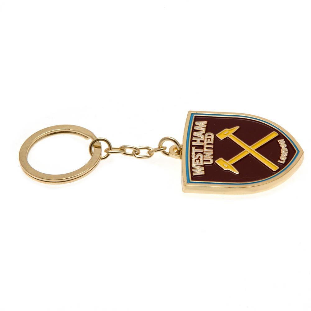 West Ham United FC Crest Keyring LKT Sport Metal crest shaped keyring with chain and split ring Die stamped design with full colour enamel infill Metal alloy with gold style finish Official licensed product Approx 45mm x 40mm On a header card Keychains