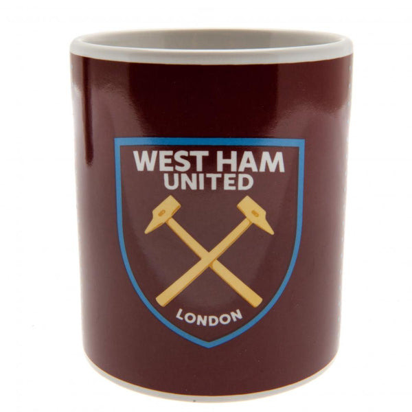 West Ham United FC Fade Mug LKT Sport Ceramic everyday coffee mug Fade design featuring WHUFC text and a full colour club crest Glazed kiln fired finish with white handle Official licensed product Approx 315ml (11oz) Approx 9cm tall, 8cm in diameter In a