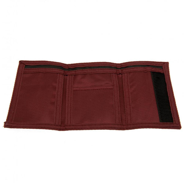 West Ham United FC Fade Wallet LKT Sport Fade design wallet featuring WHUFC text and full colour club crest5 separate internal compartmentsExternal zipped pocketWipe clean polyesterOfficial licensed productApprox 12cm x 8cm closed Wallets