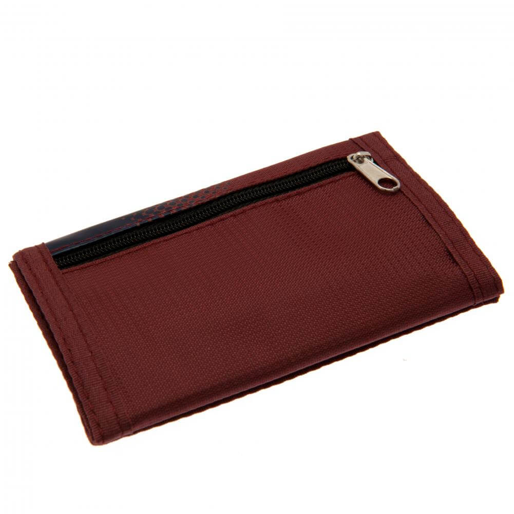West Ham United FC Fade Wallet LKT Sport Fade design wallet featuring WHUFC text and full colour club crest5 separate internal compartmentsExternal zipped pocketWipe clean polyesterOfficial licensed productApprox 12cm x 8cm closed Wallets
