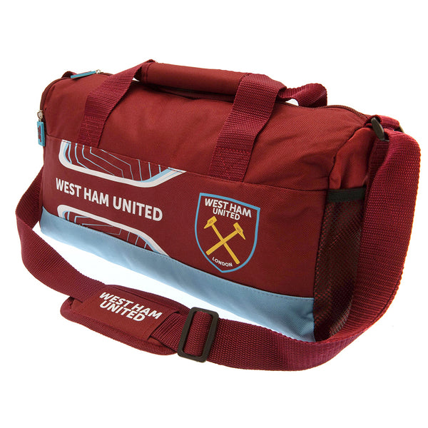 West Ham United FC Flash Duffle Bag LKT Sport Flash design duffle bag featuring West Ham text and club crestLarges zipped opening for easy accessAdditional zipped and mesh end pocketCarry handles and adjustable shoulder strapRubber zip pulls featuring rai