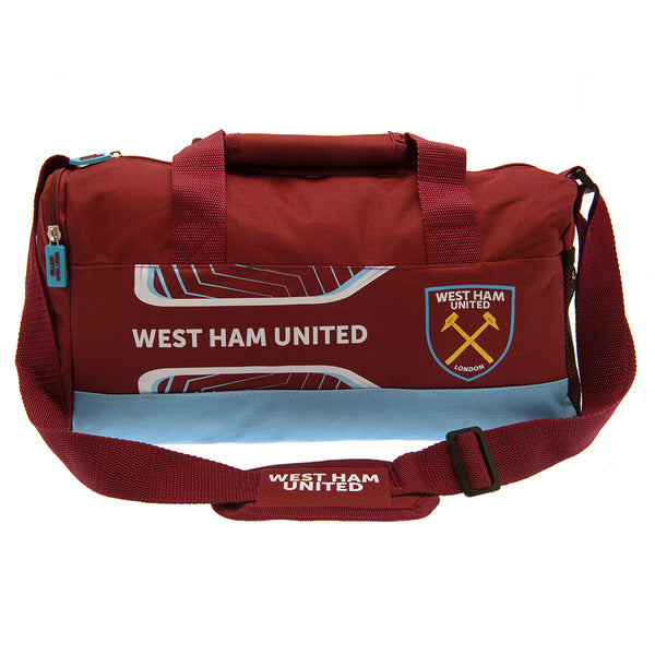 West Ham United FC Flash Duffle Bag LKT Sport Flash design duffle bag featuring West Ham text and club crestLarges zipped opening for easy accessAdditional zipped and mesh end pocketCarry handles and adjustable shoulder strapRubber zip pulls featuring rai