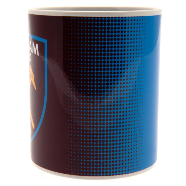 West Ham United FC Halftone Mug LKT Sport Ceramic everyday coffee mug Halftone design featuring a full colour West Ham United club crest Glazed kiln fired finish with white handle Official licensed product Approx 315ml (11oz) Approx 9cm tall, 8cm in diame