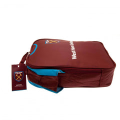 West Ham United FC Kit Lunch Bag LKT Sport Home shirt design lunch bag featuring West Ham United text and club crestDouble zipped opening for easy accessWith carry handle and name tagWipe clean polyesterOfficial licensed productApprox 29cm x 24cm x 7cm Lu