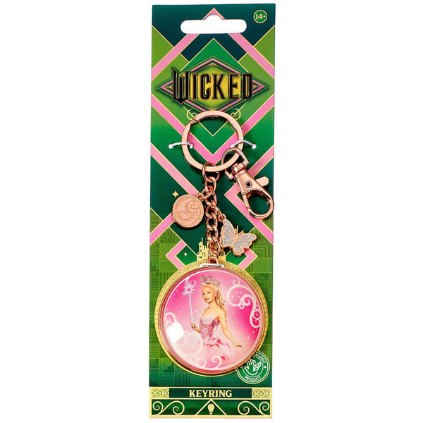 Wicked Glinda 3D Bubble Keyring LKT Sport Bright, colourful and highly detailed 3D bubble keyringFeaturing a pretty in pink image of a smiling GlindaKeyring also features a small Butterfly and a Glinda charmMetal alloy with a rose gold style finishOfficia