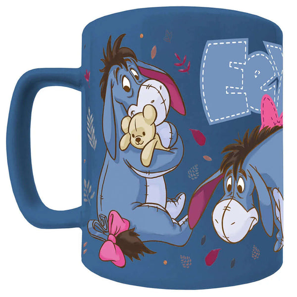 Winnie The Pooh Fuzzy Eeyore Mug LKT Sport Enjoy your drink with a touch of Eeyore's charm.. this mug combines unique design along with a removable fluffy cover for added comfortThis blue mug includes images of Eeyore with his name across the topThe fluff