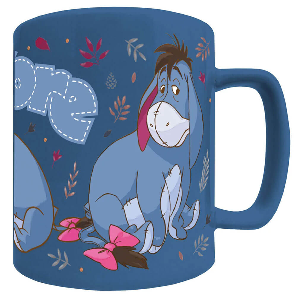 Winnie The Pooh Fuzzy Eeyore Mug LKT Sport Enjoy your drink with a touch of Eeyore's charm.. this mug combines unique design along with a removable fluffy cover for added comfortThis blue mug includes images of Eeyore with his name across the topThe fluff