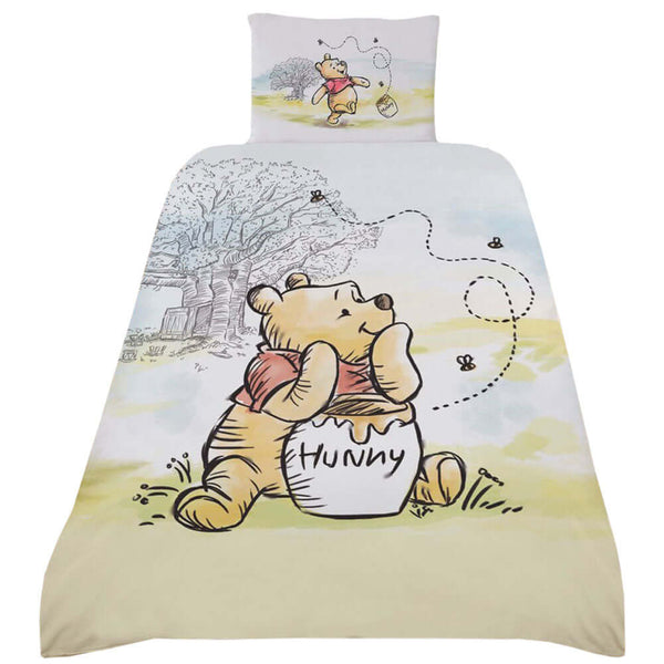 Winnie The Pooh Single Duvet Set LKT Sport Bed linen set to fit standard single bedsBeautiful quilt cover featuring Winnie The PoohReverse features a multi character designPillowcase features Winnie The Pooh55% Cotton, 45% Polyester machine washableOffici